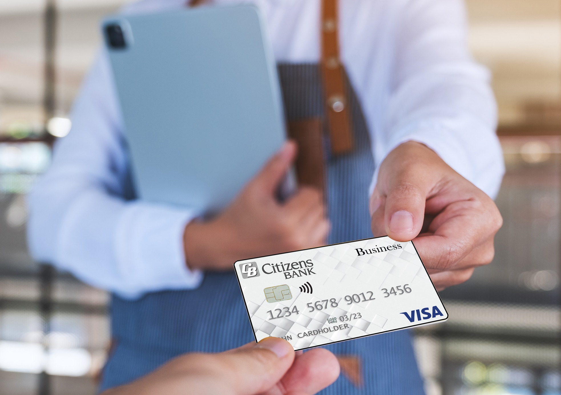 barista accepting business credit card