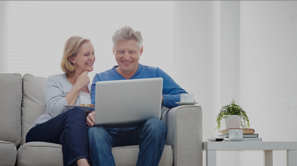 Couple with computer image. 