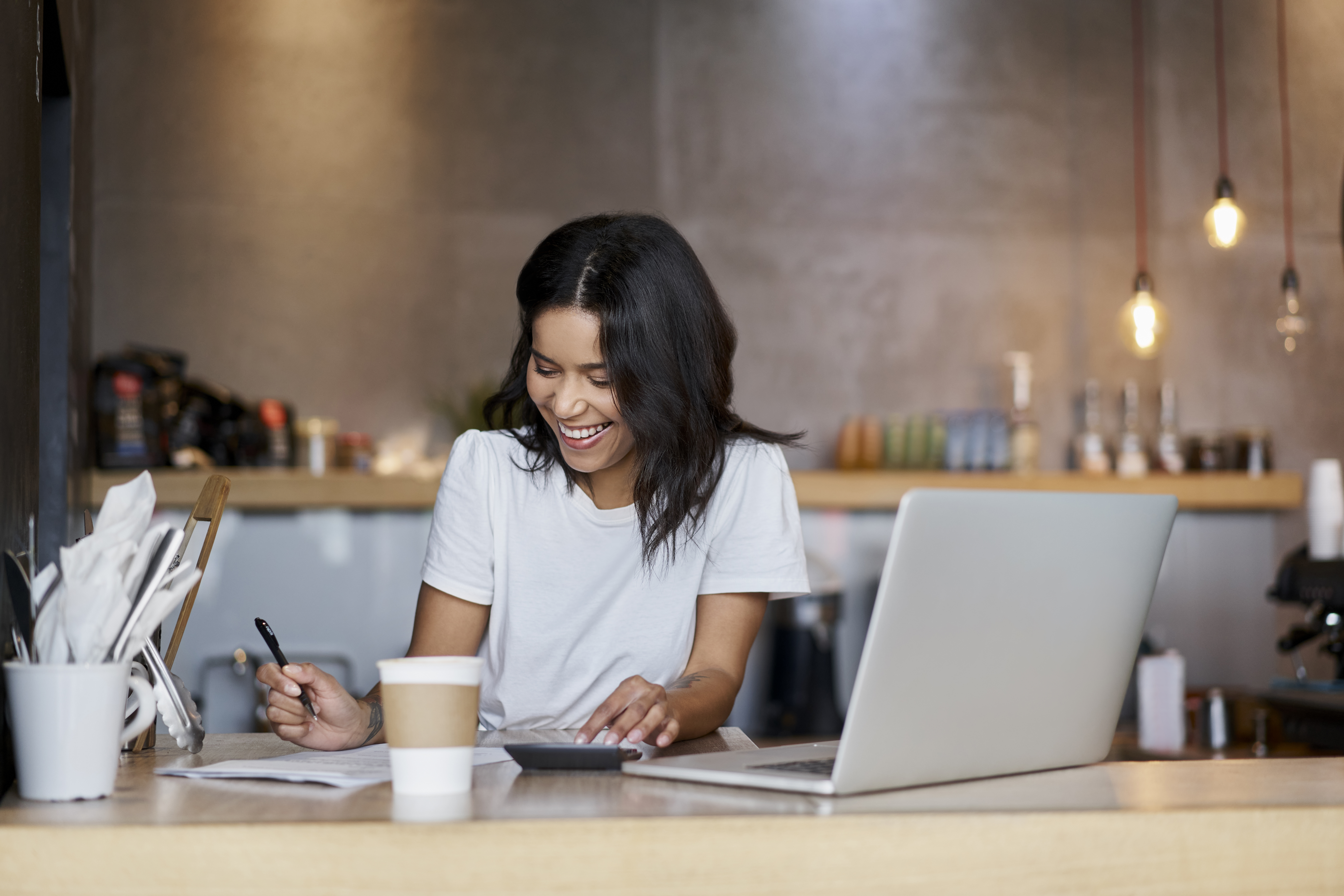 woman with laptop and coffee