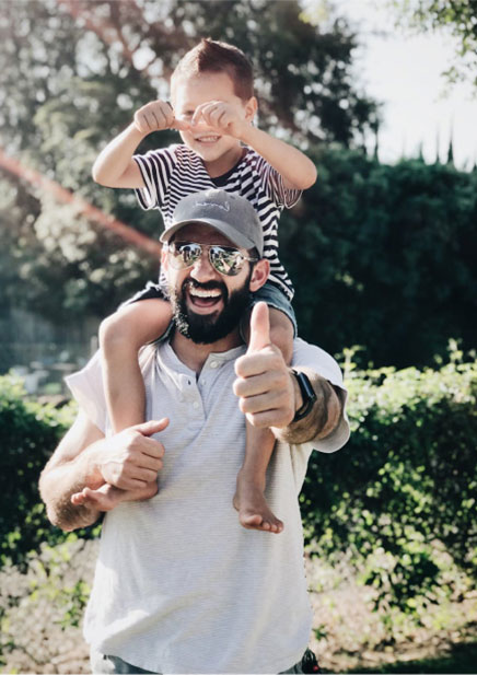 Dad and son going on a walk