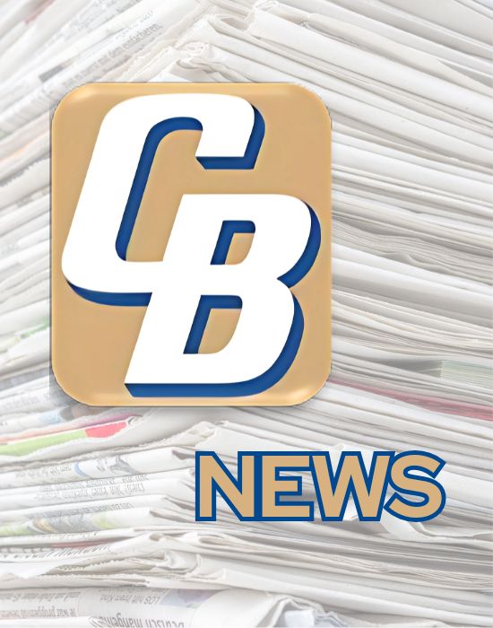 Citizens Bank Icon logo for CB News section, in front of a large stack of newspapers