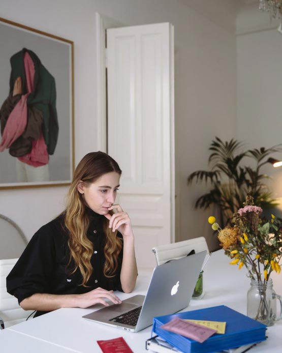 A lady working in her office