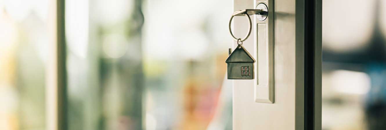 Mortgage loan key in home lock