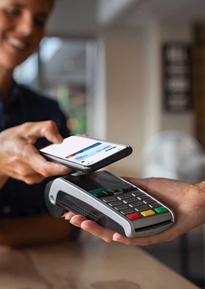 Using digital wallet on phone at store